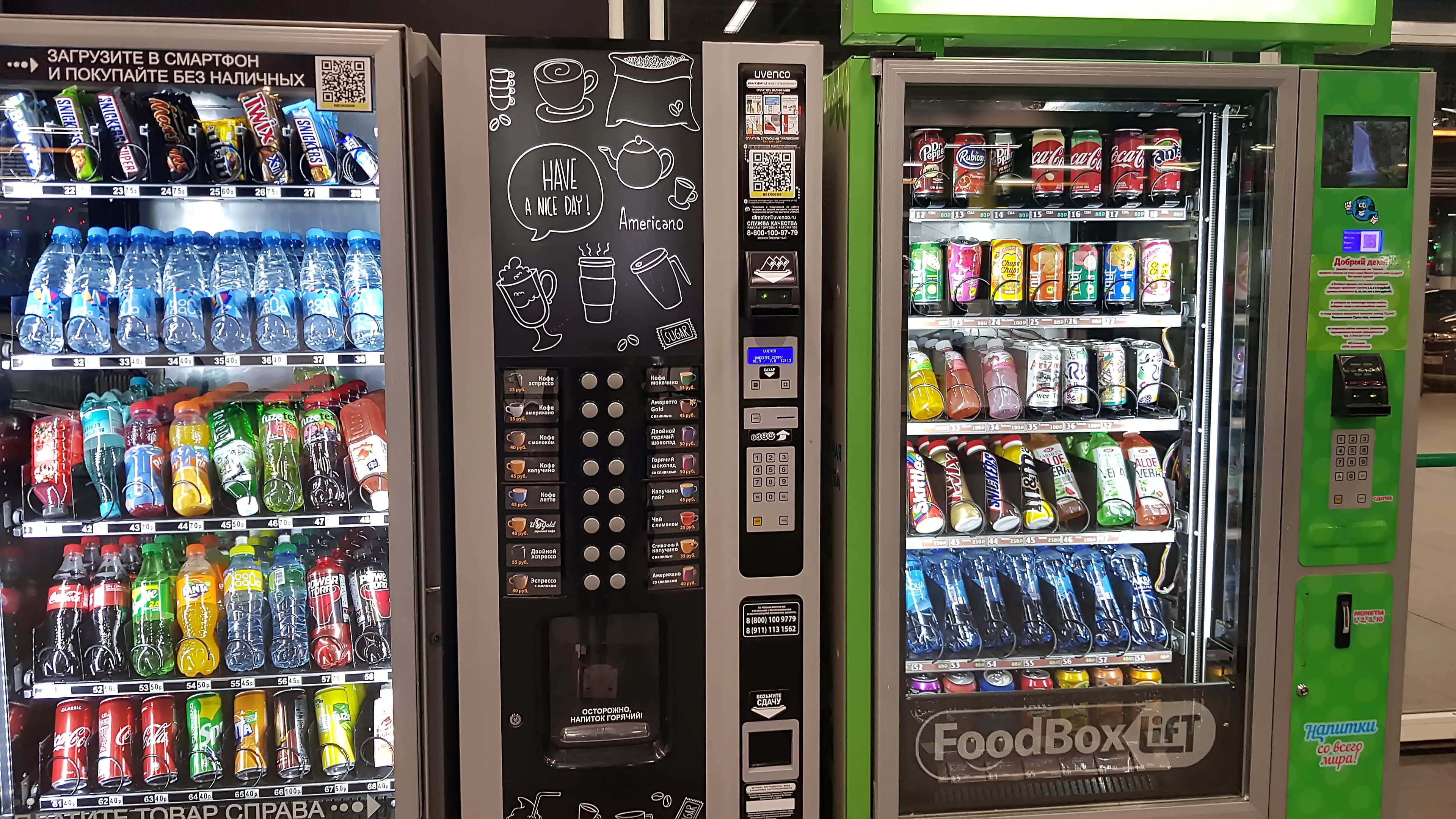 Modern beverage vending machine stocked with cold drinks